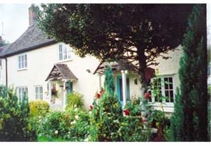 Set in lovely garden with lawn and box hedges