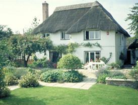 Thatched house in a beautiful garden in the heart of Wiltshire.