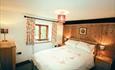 This Grade II Listed semi-detached cottage is comfortably furnished.