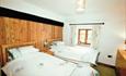 This Grade II Listed semi-detached cottage is comfortably furnished.