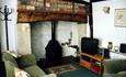 Semi-detached 250 year old thatched cottage in conservation area.