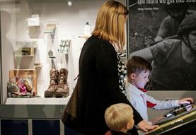 Family looking at museum display