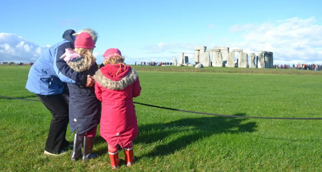 Family at Stonehenge, Amesbury, Wiltshire