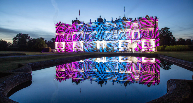 Longleat House illuminated with coloured lights