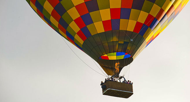 hot air balloons above the Wiltshire countryside