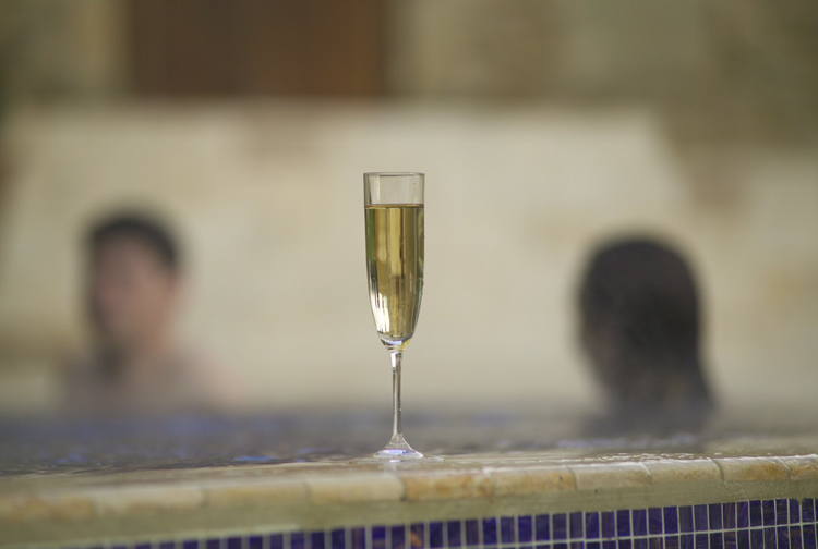 Couple in pool at luxury spa