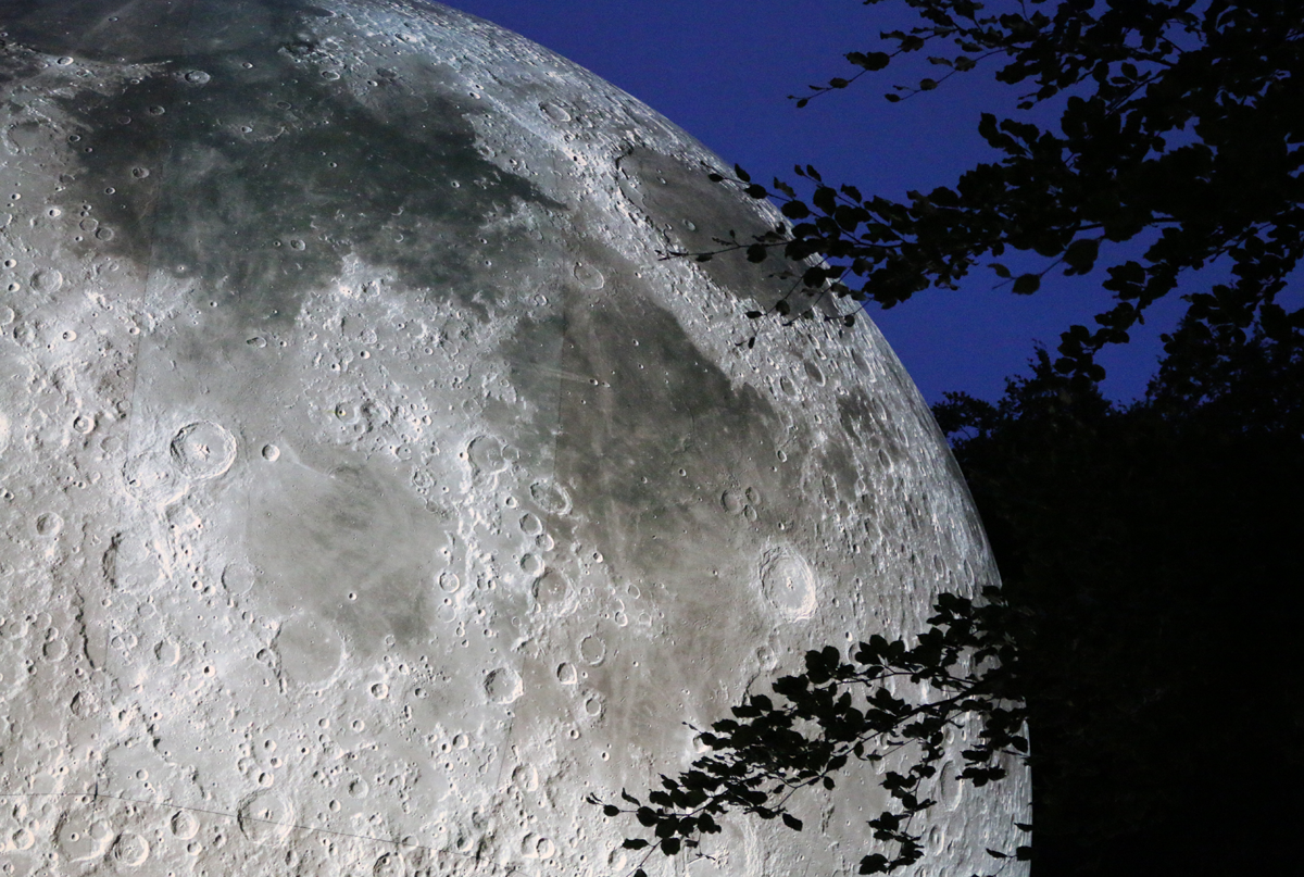 Details of the moon against a dark blue sky