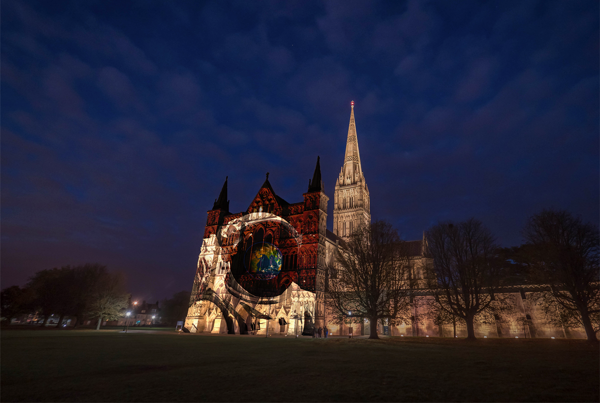 salisbury cathedral illuminated with coloured lights