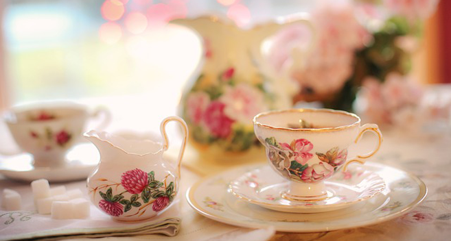 Table set up with tea pot and cups